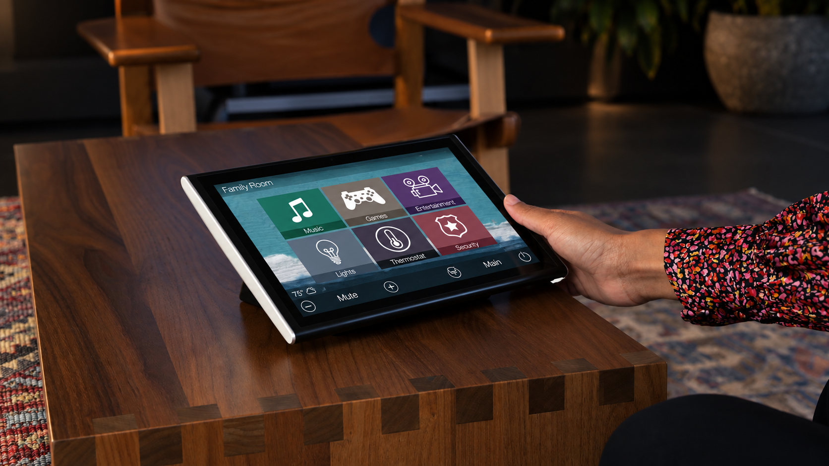 A URC touch panel on a coffee table driving the whole family room